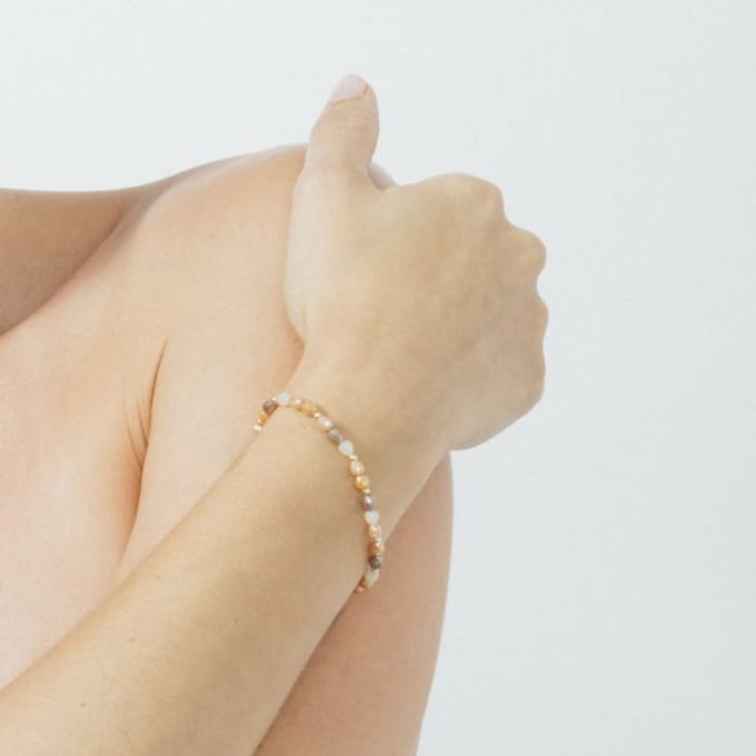 Luxenter Armband van bruin glas met 18-karaats geelgouden afwerking - Likdu
