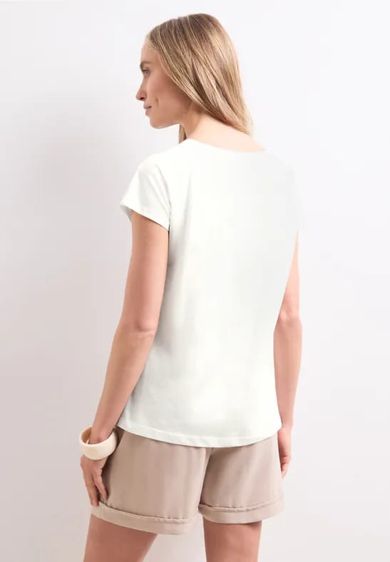 Shirt met hangende schouder en tekst