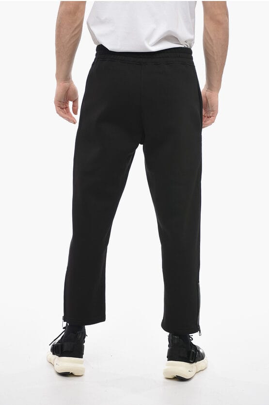 Losse joggingbroek van katoenmix met enkelrits in zwart