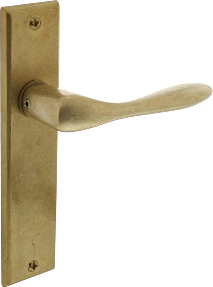 Intersteel Deurkruk Banaan met schild 181x41x7mm blind messing getrommeld