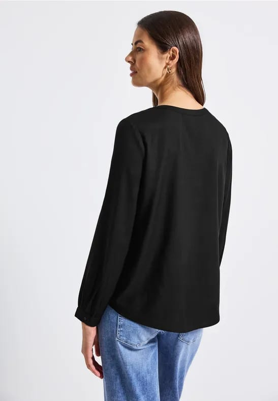 Tuniek met gespleten hals