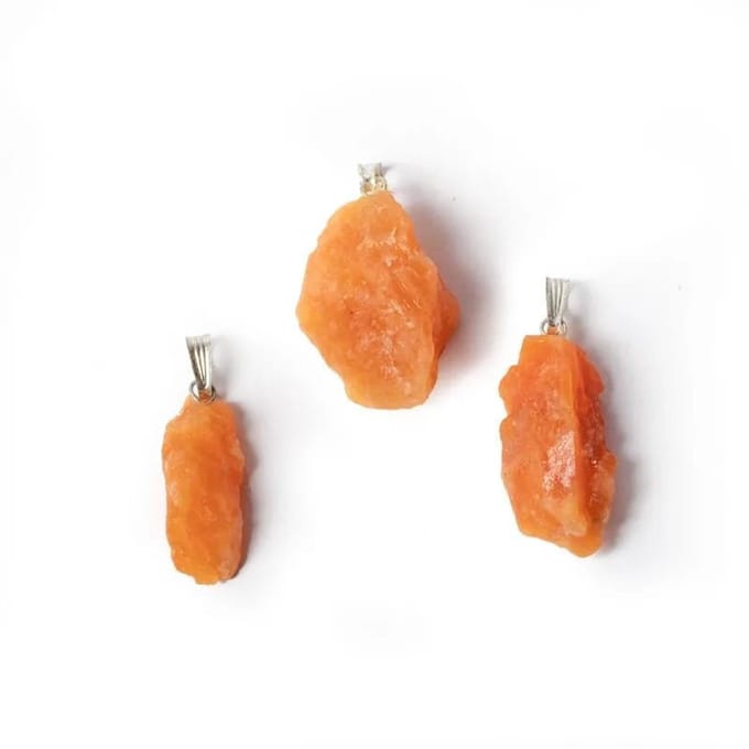 Oranje calciet ruw edelsteenhanger