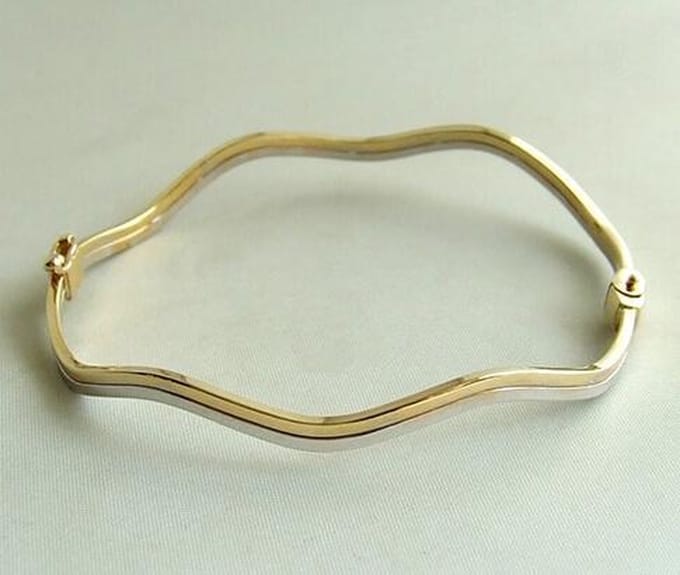 Gouden bicolor bangle golvend model