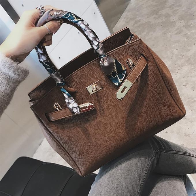 2020 Lock Handtas Mode Lychee Patroon Enkele Schouder Diagonaal Platina 30cm*15cm*24cm bruin