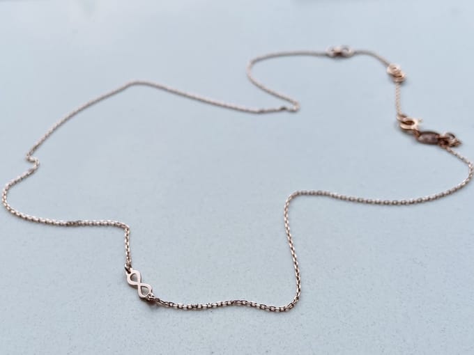 Ketting klein infinity teken | Rosekleurig | AG925