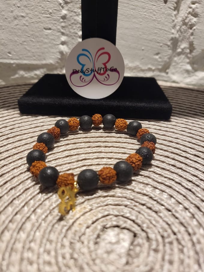Armband radraksha/lavasteen met ohm elastisch
