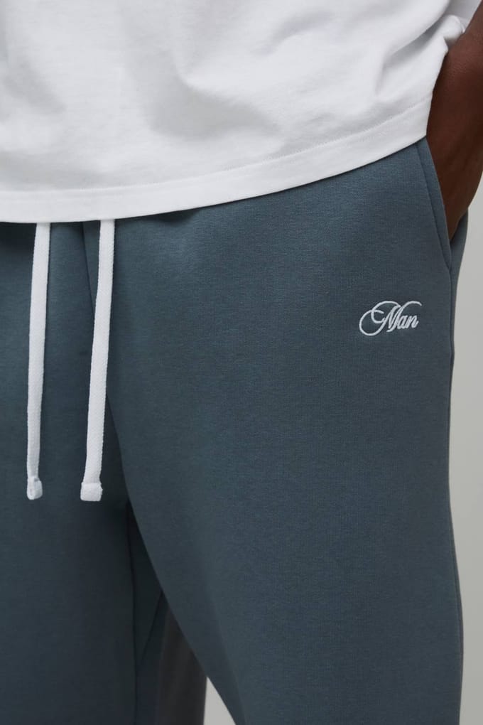 Oversized joggers voor mannen met scriptprint en verlaagde kruis | Slate Blue | Size XL