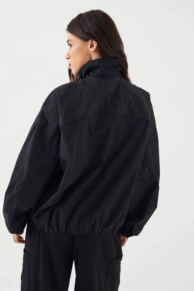 Dames DSGN Studio Nylon Ritssluiting Trechter Kraag Track Jacket | Zwart | Maat: Large