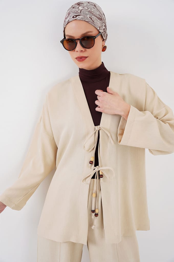 V-hals cardigan en wijde broekset