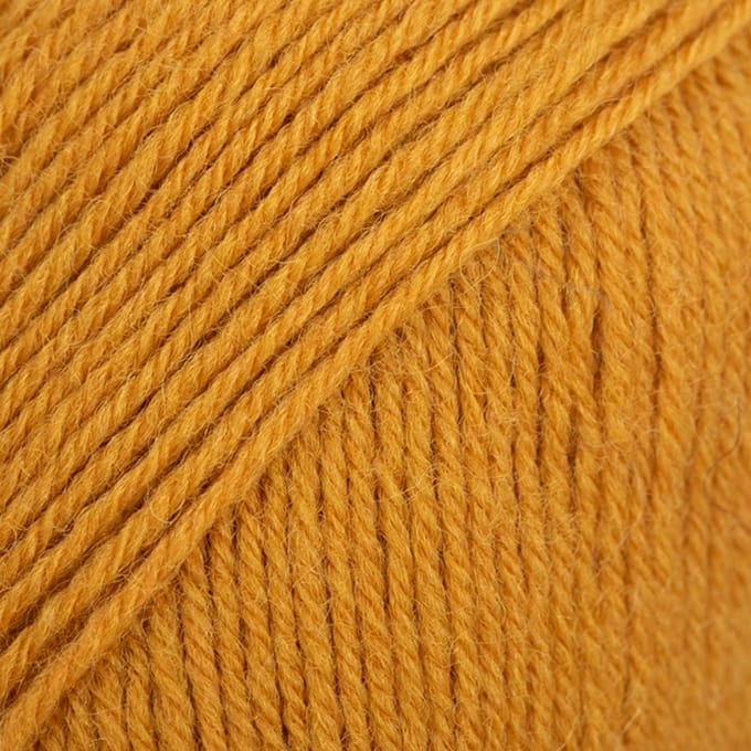 DROPS Fabel Uni Colour - 111 mosterdgeel - Wol Garen