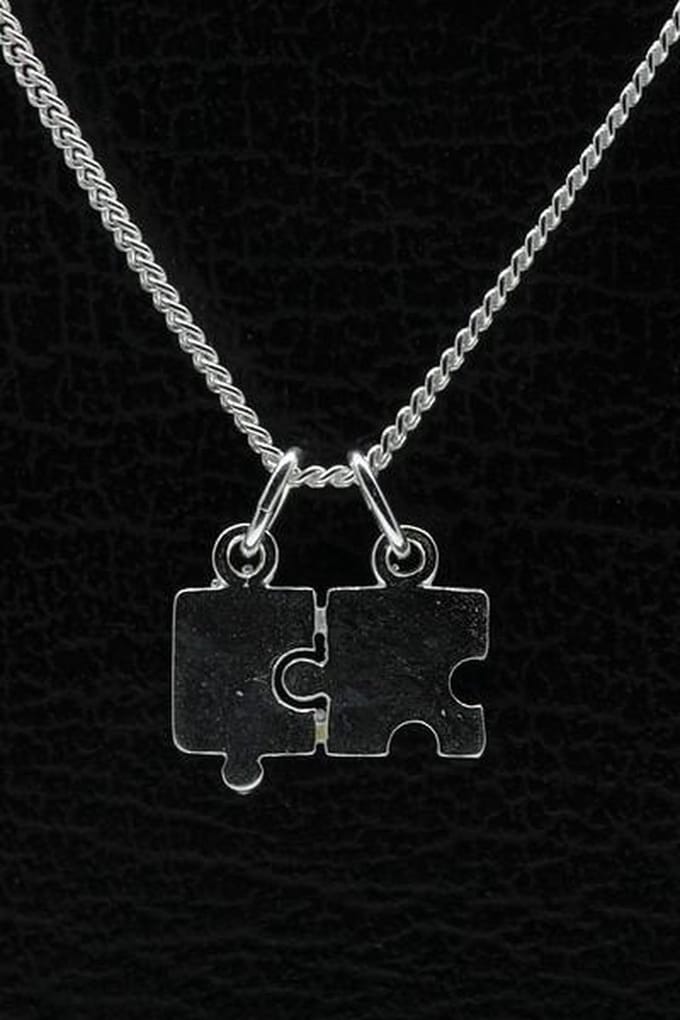 Zilveren Puzzelstuk ketting hanger - klein