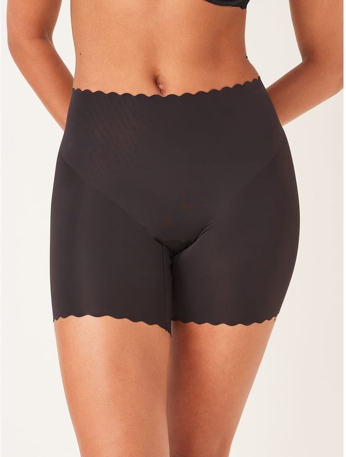 Next - Dames - Buik- en dijcorrigerende slip met geschulpte rand - Zwart