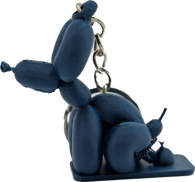 Poepende ballon hond sleutelhanger - Mint
