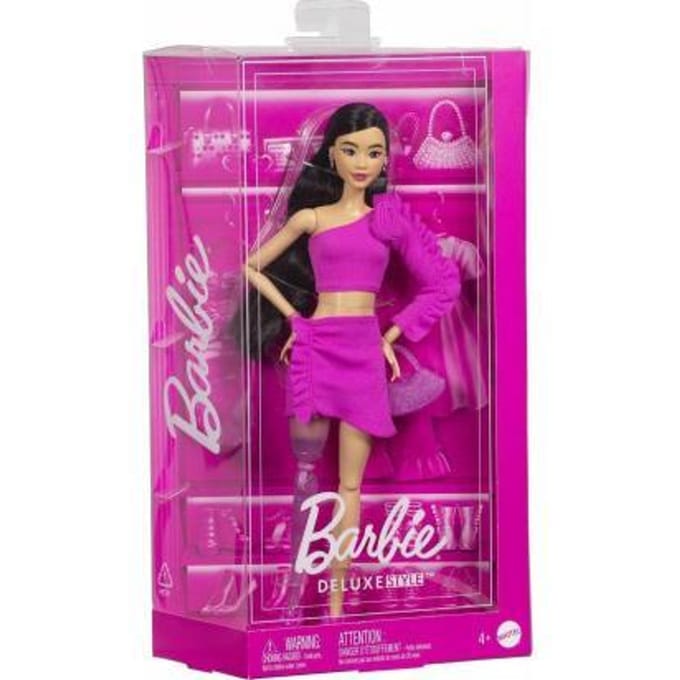 Barbie Deluxe Stijl - Roze set met topje en rok - Barbiepop met beenprothese