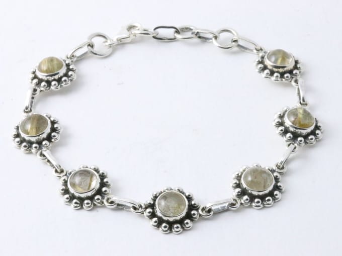 Bewerkte zilveren armband met gouden rutielkwarts