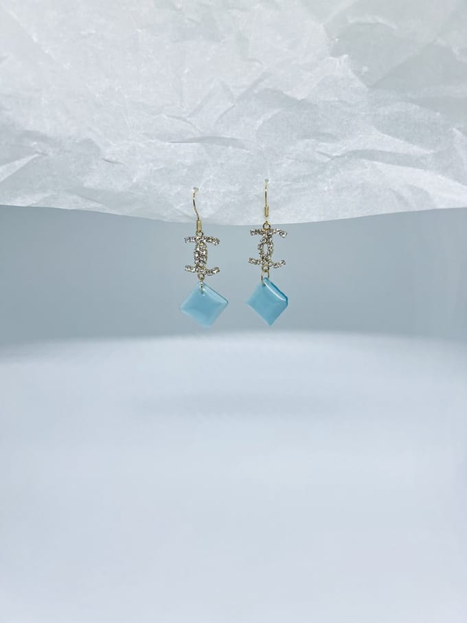 CC oorbellen met blauw ruitje | goud gekleurd