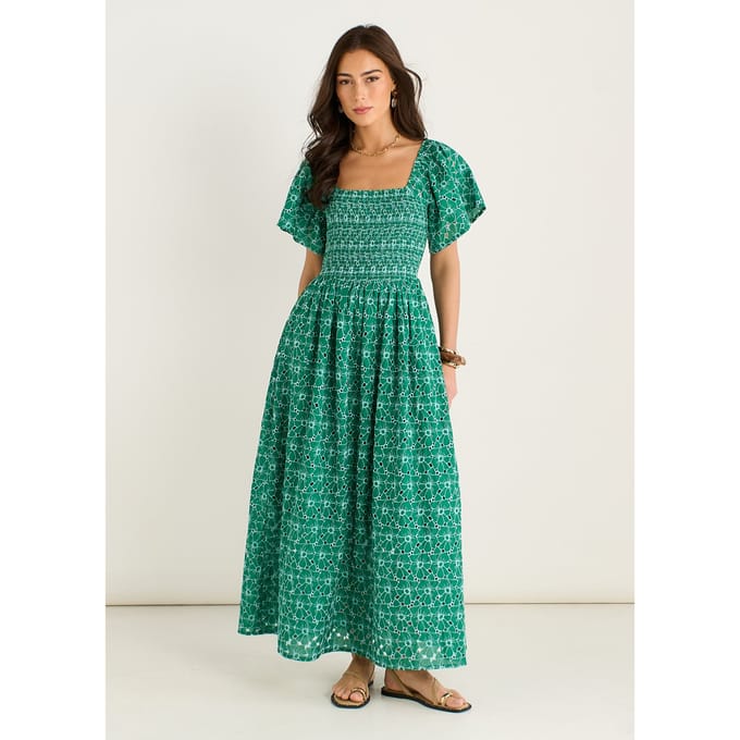 Groene midi-jurk met bloemenbroderie en plooien