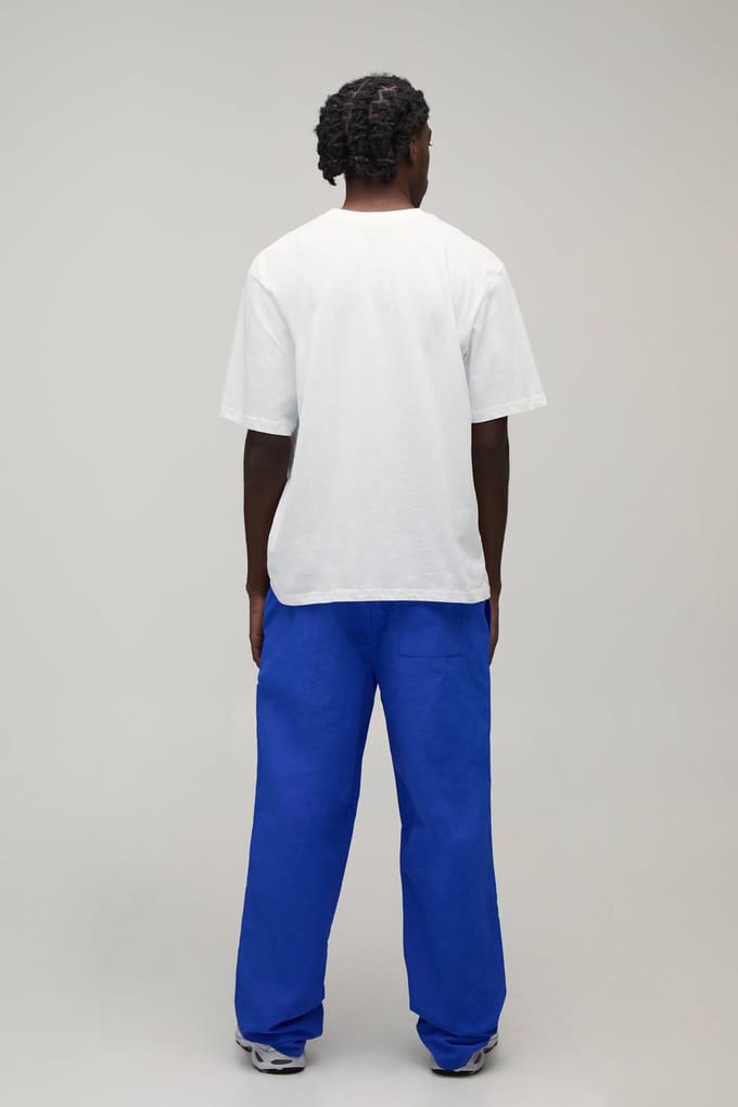 Relaxed Fit Side Stripe Logo Print Nylon Track Pants | Blue | Size Medium