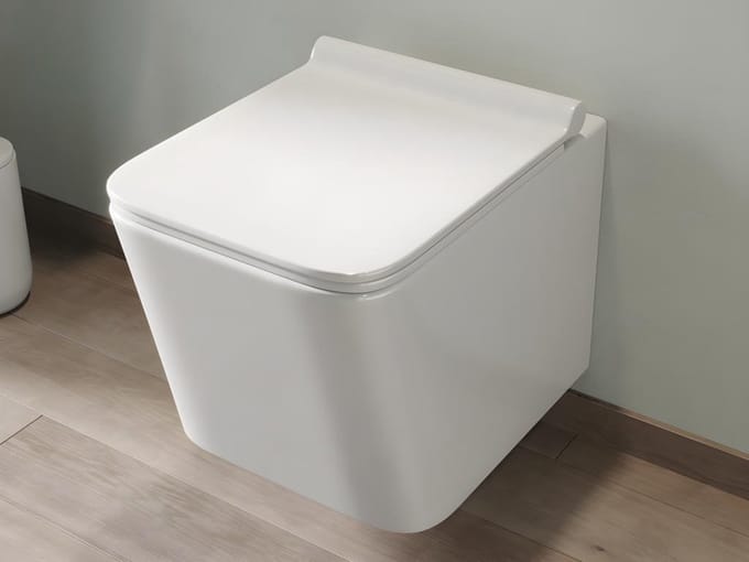 Vente-unique Witte hang-wc in keramiek zonder rand - CLEMONA