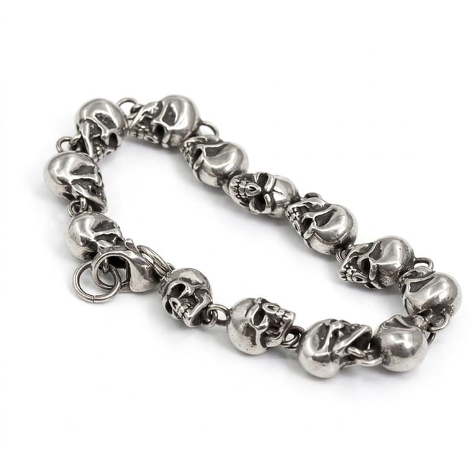 Zilverkleurige heren schakel armband met schedel schakels