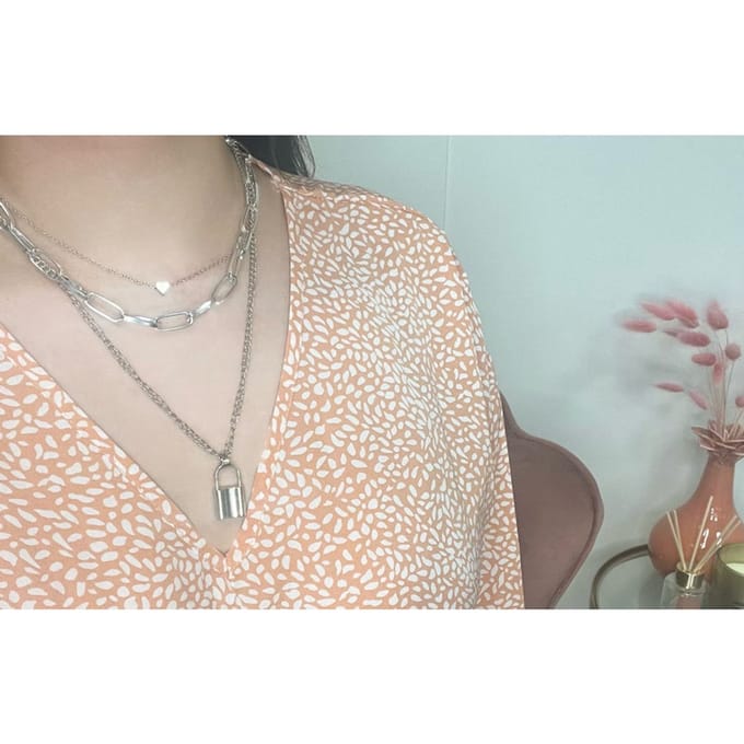 Laagjes ketting slotje & hartje | zilver gekleurd