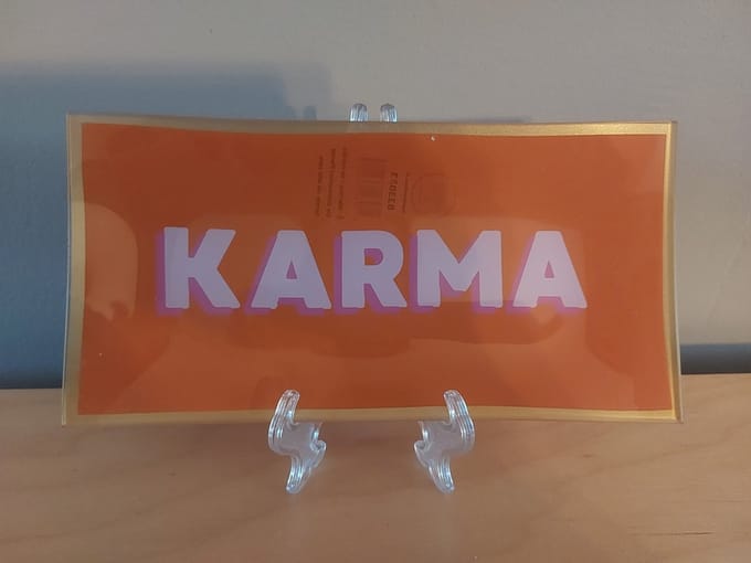 leuk bordje met de tekst : Karma