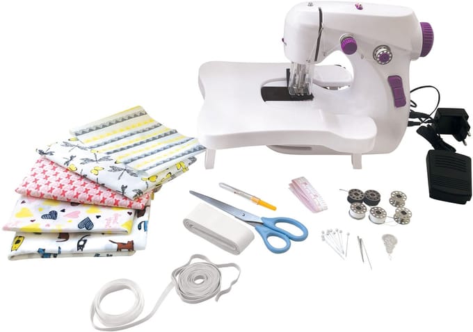 L’Atelier de Couture - Machine à coudre lumineuse