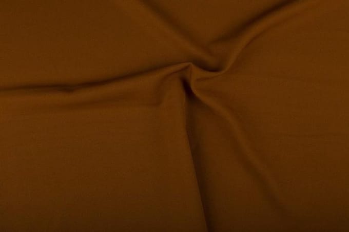 Texture/Polyester stof - Lichtbruin - 25 meter
