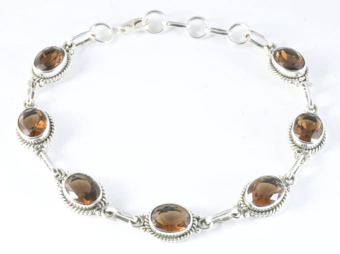 Bewerkte zilveren armband met rookkwarts