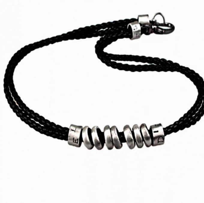 Zwarte koord armband - gun- metalen elementen - Charme Bijoux