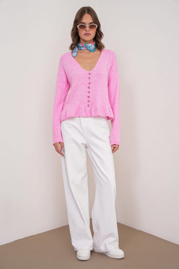 Lichte V-hals gebreide top met knoopdetails