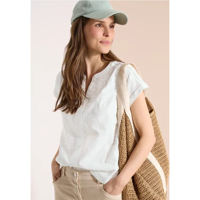 Blouse met hangende schouder en borduursel