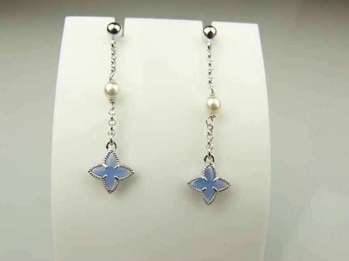 oorringen in zilver model star met parel - jeansblauw