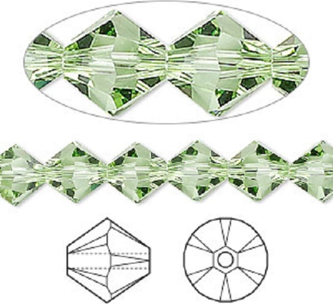 Swarovski Elements, Xilion Bicone (5328), 10mm, peridot. Per 12 stuks