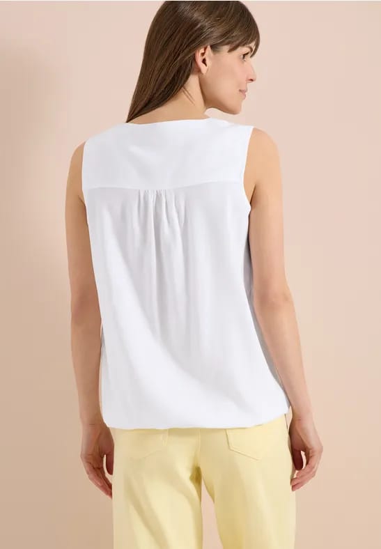 Blousetop met gespleten hals en linten