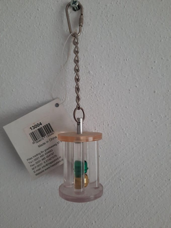 Speelgoed voor papegaai en parkiet. "Bell in the Box"