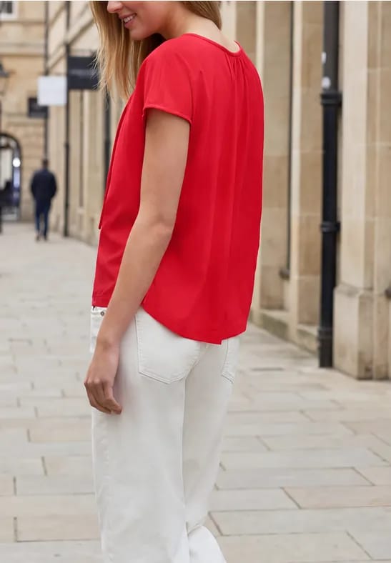 Blouse met hangende schouder en linten