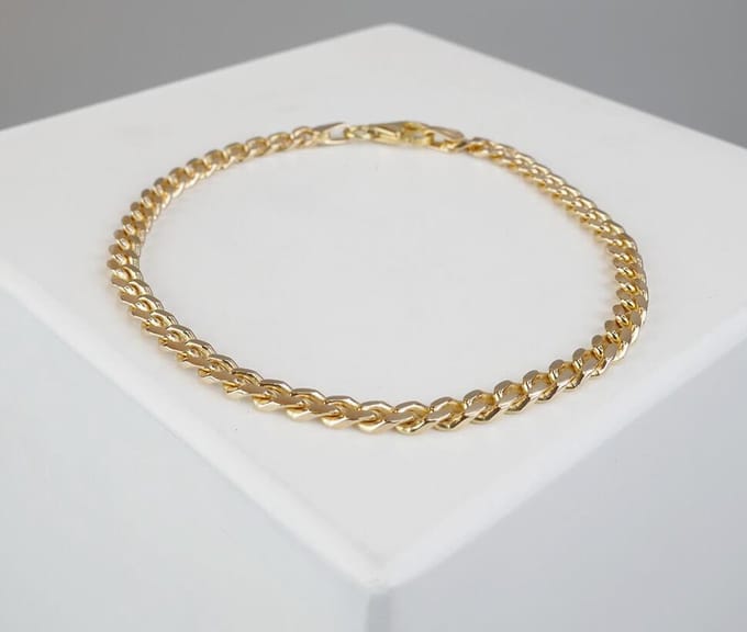 Christian massieve armband
