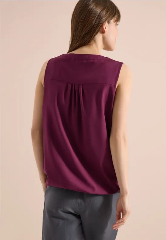 Blousetop met gespleten hals en linten