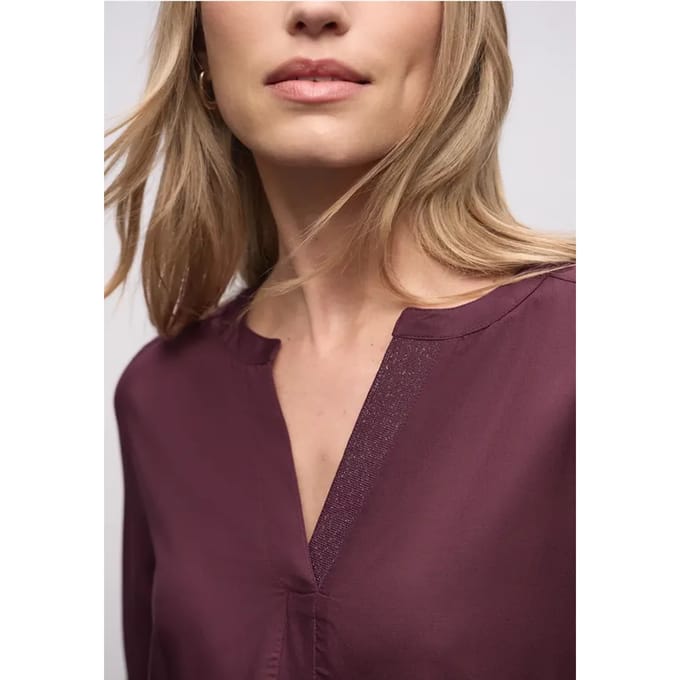 Blouse met glitterdetail