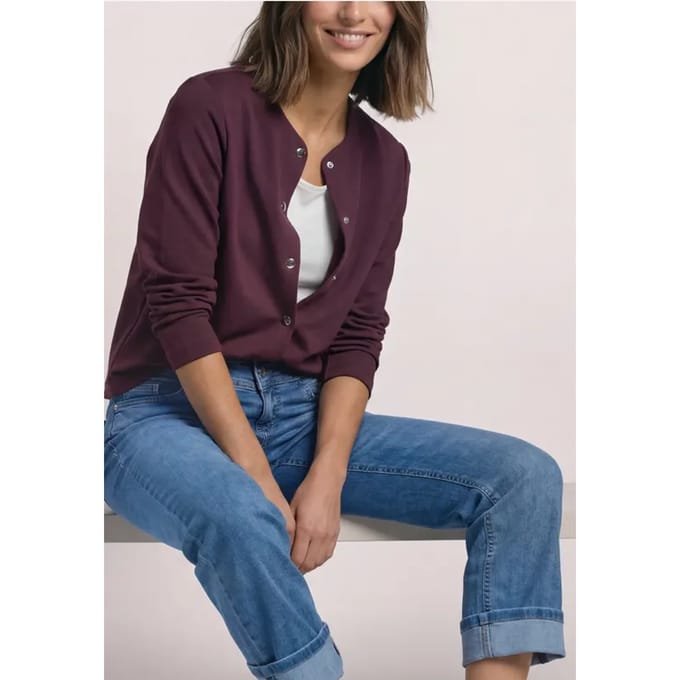 Jasje met gebreide look en decoratieve knopen