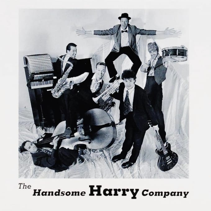 the HANDSOME HARRY COMPANY - RED GREY AND BLUE