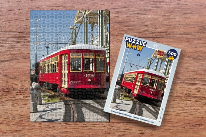 Puzzel Een rode tram vervoert mensen in New Orleans - Legpuzzel - Puzzel 500 stukjes