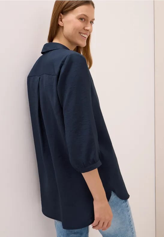 Lange blouse in effen kleur