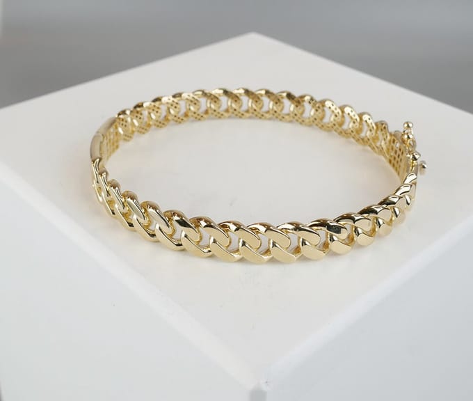 Christian Dames schakelarmband - Goud