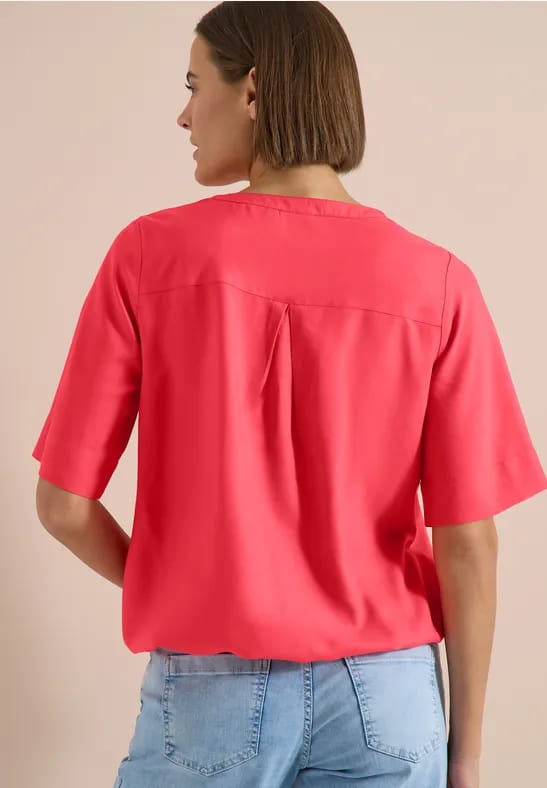 Blouse met korte mouwen en gespleten hals