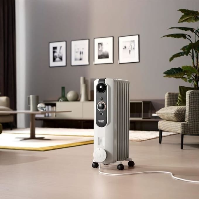 Oliegevulde radiator - DELONGHI - 1500 W - Tot 45 m2 - Mobiel - Vorstbeveiliging - Grijs