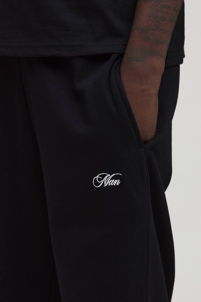 Essentiële Baggy Men's Script Joggingbroek | Black | Size Medium