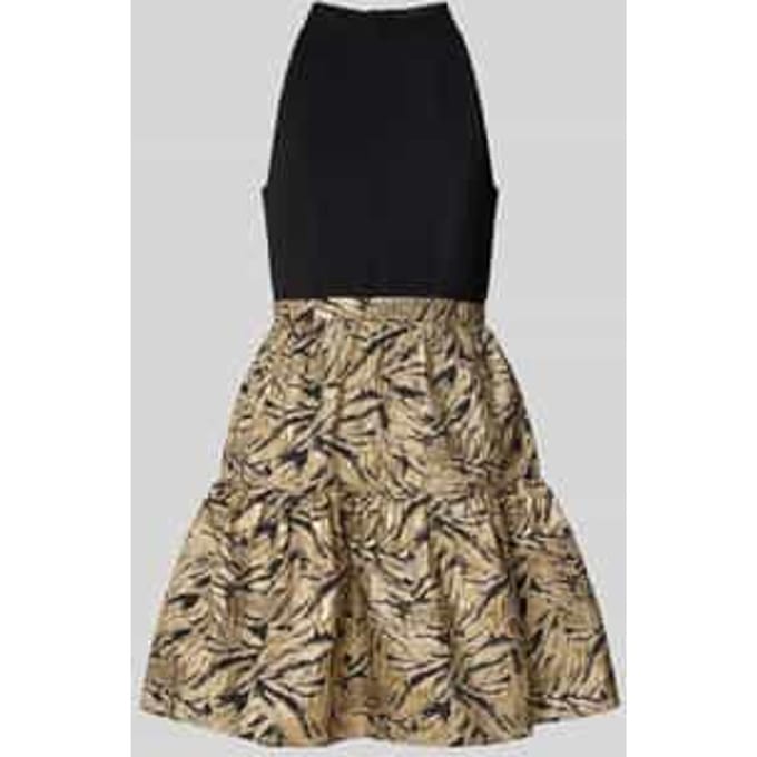 Cocktailjurk in 2-in-1-look.