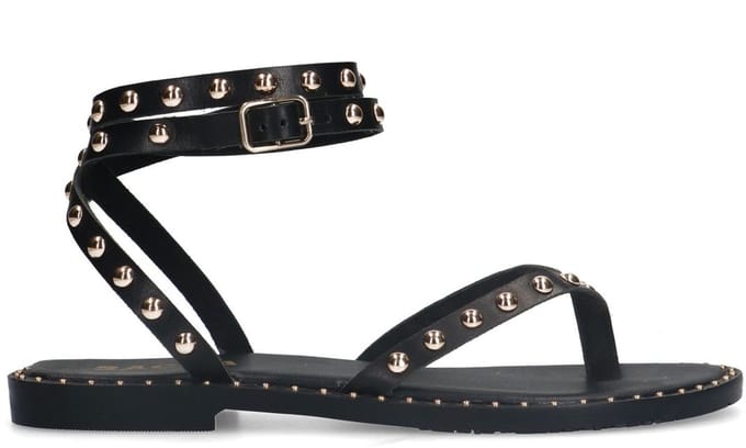 Sacha - Dames - Zwarte leren platte sandalen met goudkleurige studs - Maat 38